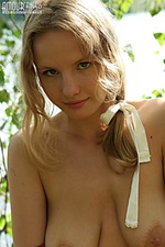 Slim adult female pics near a lake