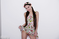 Brunette cutie goes naked