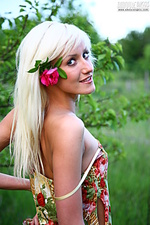 Teen naked girl with pink flowers