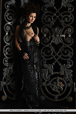 Prima prima shows off her flexible body as she poses in a victorian costume