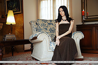 Zsanett tormay zsanett tormay shows off her sexy, tight body as she sensually poses on the sofa.