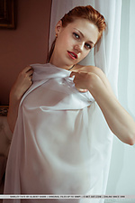 Shirley tate shirley tate strips her sexy lingerie on the bed baring her pink pussy.