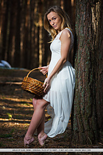 Aislin aislin performs a slow and sensual striptease in the middle of the woods
