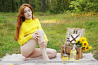 Jia lissa redhead jia lissa strips outdoors as she displays her trimmed pussy.