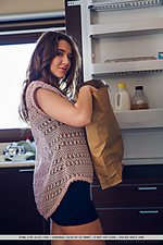 Sybil a sybil a stripteases in the kitchen to show off her gorgeous assets