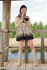 Dominika jule newcomer dominika jule strips by the lake baring her creamy body and pink cherry.