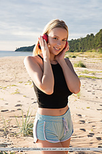 Agatha agatha delightfully poses at the beach as she bares her amazing titties.