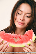 Mila m gets naughty and naked while eating a watermelon