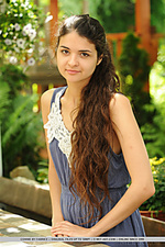 Connie portrays a sweet and cute garden nymph with her long, wavy brown hair, naturally beautiful face without any hint of makeup, and an exquisite body with womanly curves.