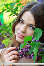 With her youthful beauty and innocent looks, nedda a portrays a beautiful garden nymph spending a relaxing day with the flowers and lush green grass and trees.