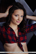 Blue-eyed goddess ardelia a seductively posing in her plaid top that shows off her tight abs, and skimpy shorts and knee-high socks that highlight her firm ass and athletic build.