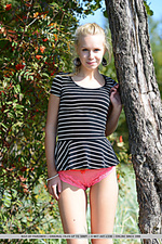 Cute and youthful rozi in her debut series, strips her dress with pink lingerie as playfully poses naked outdoors.